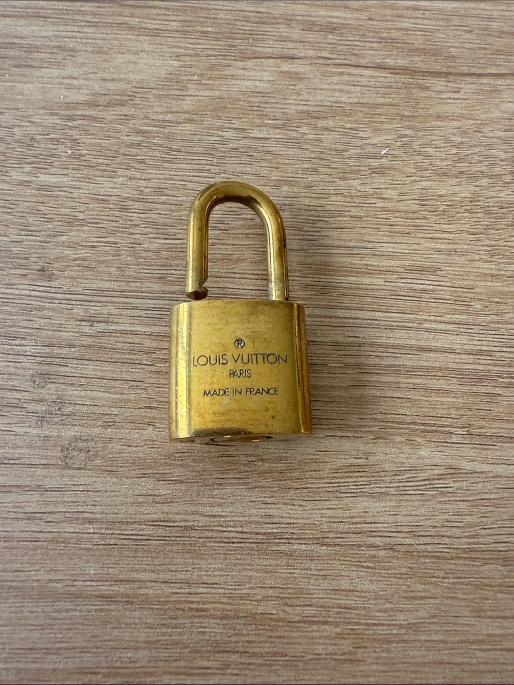 Louis Vuitton compact gold